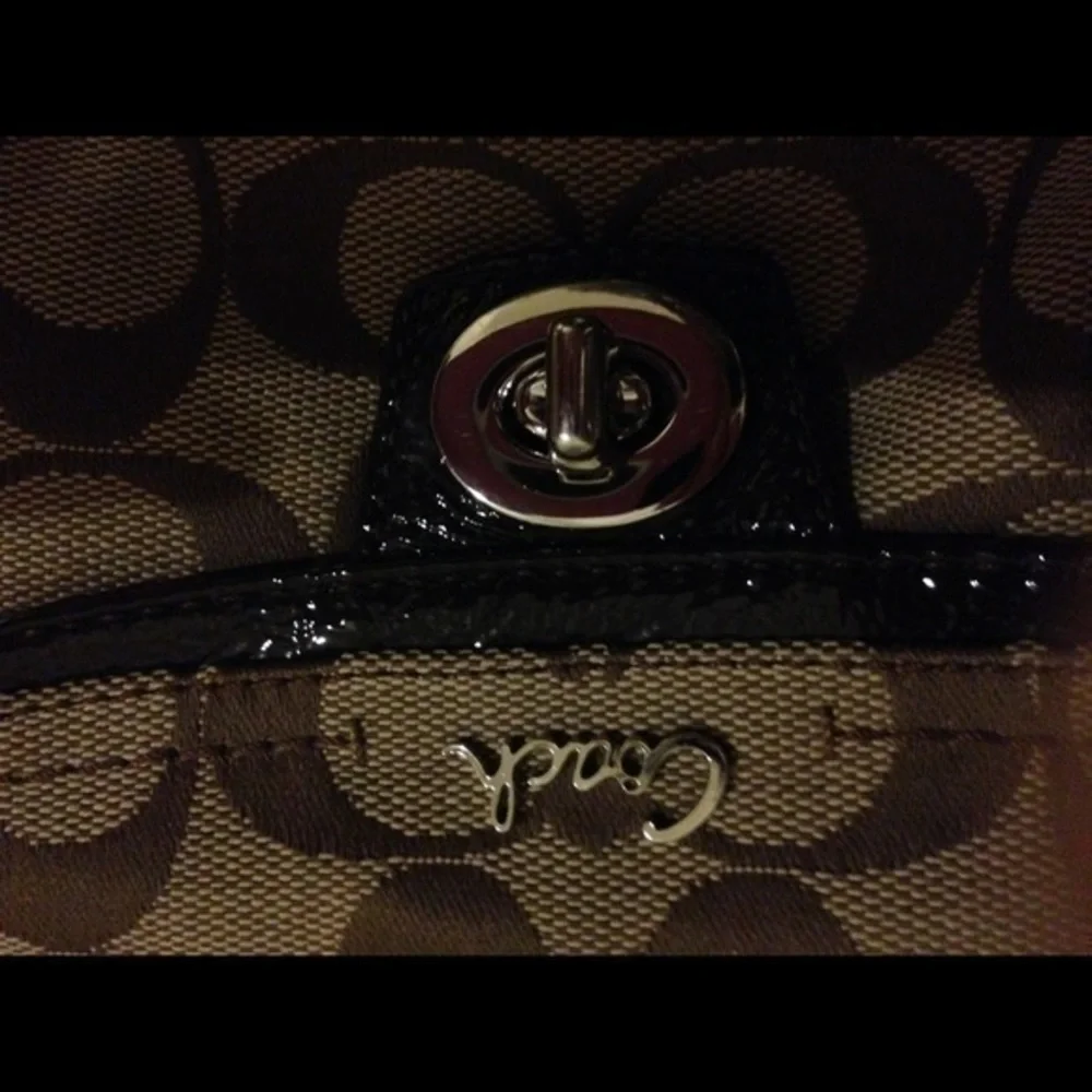 COACH signature c brown crossbody turnlock bag
